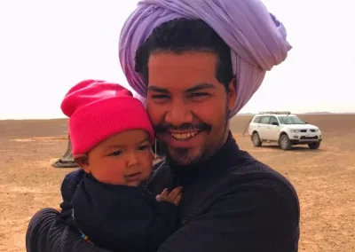 driver with child in sahara desert trips